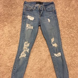 Express distressed cropped skinny jeans